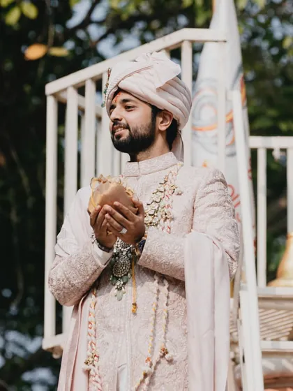 The groom on his way to the temple, embodying grace and tradition.