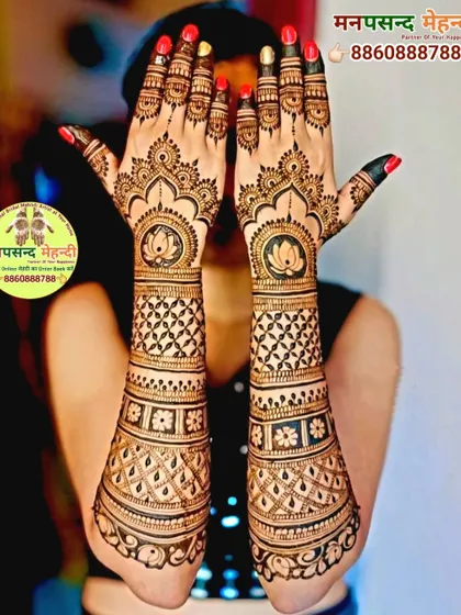 A stunning back-of-hand design featuring lotus mandalas and intricate geometric patterns. This is a popular choice for brides and bridesmaids who want a stylish look.