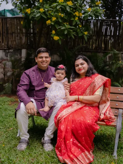 A bond wrapped in love, stronger than anything. A beautiful family portrait in traditional attire.