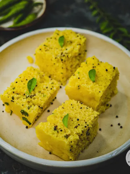 DHOKE to bahut kha liye, ab thoda DHOKLA khalo. Our light and spongy Khaman Dhokla, tempered with mustard seeds and curry leaves, is a healthy and delicious snack.