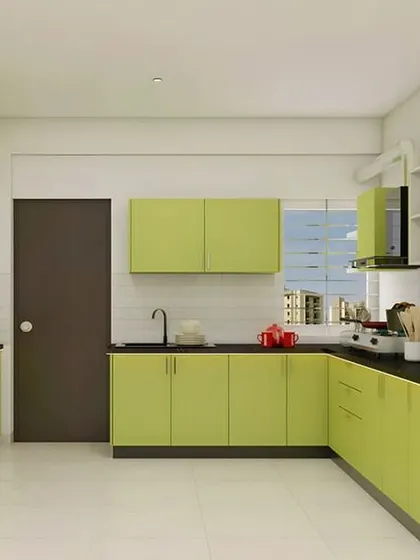 For those who love color, this lime green L-shaped kitchen makes a cheerful statement. The dark countertops and door provide a grounding contrast to the bright cabinetry.