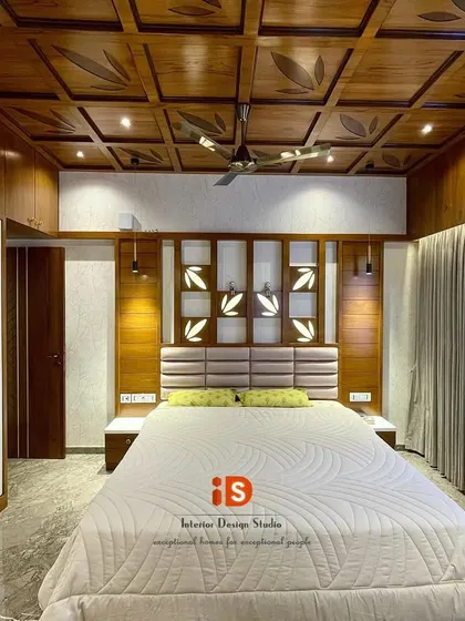 This perspective of the traditional bedroom showcases the spacious layout and the beautiful contrast between the dark wood and the light-colored walls and bedding.