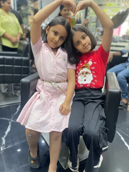 A great haircut experience is for everyone, including the little ones. I make sure kids feel comfortable and have fun, leaving with a cute, stylish haircut and a big smile. Here are two happy sisters showing off their fresh new bobs.