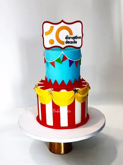 A carnival-themed cake for a company's 10th-anniversary celebration. This 3kg Chocolate-Dulce de leche cake brought the fun of the carnival to a corporate milestone.