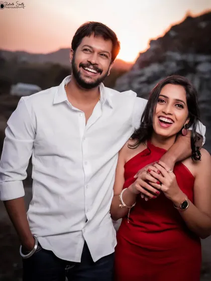 The genuine, joyful laughter in this photo is infectious. It’s a perfect example of a candid moment during a pre-wedding shoot, capturing the couple's fun-loving dynamic.