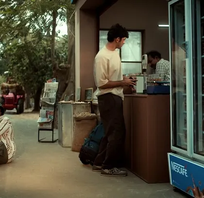 A scene from a Nescafé commercial I styled, capturing a moment of rest on a road trip. The relaxed, travel-friendly outfits help to tell the story of two friends on an adventure.