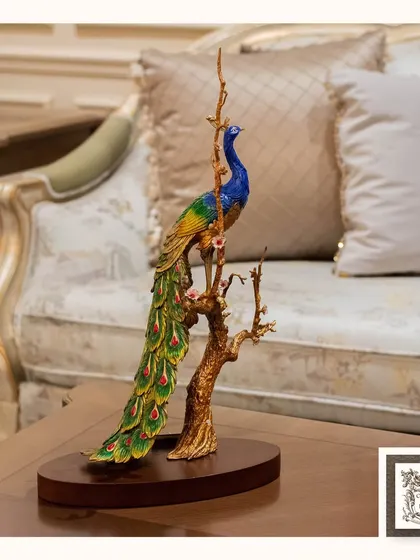 The intricate detailing and vibrant colors of this peacock sculpture make it a true conversation starter. Placed on a coffee table, it brings a touch of artistry and elegance to your living room.