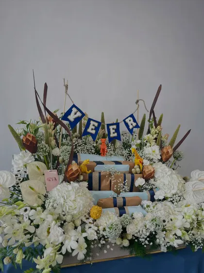 The grand floral and gift hamper for Veer's birthday.