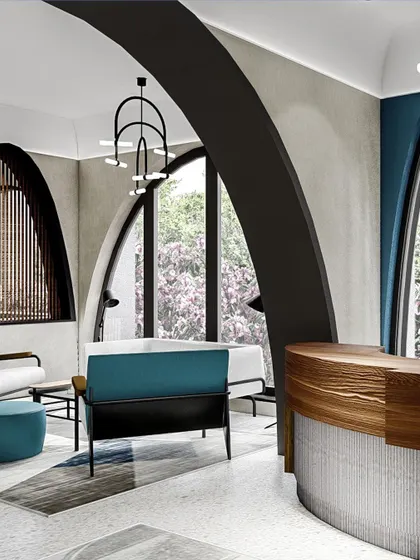 A rendering of the lobby for the Appaswamy ARCUS project in Chennai. The design uses a series of arches and a palette of wood, terrazzo, and modern furniture to create a contemporary space rooted in tradition.
