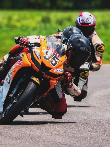 Proper race craft is learned through practice. Our training includes on-track sparring sessions where riders learn to navigate close-quarters racing, honing their overtaking skills and defensive lines against other talented racers.
