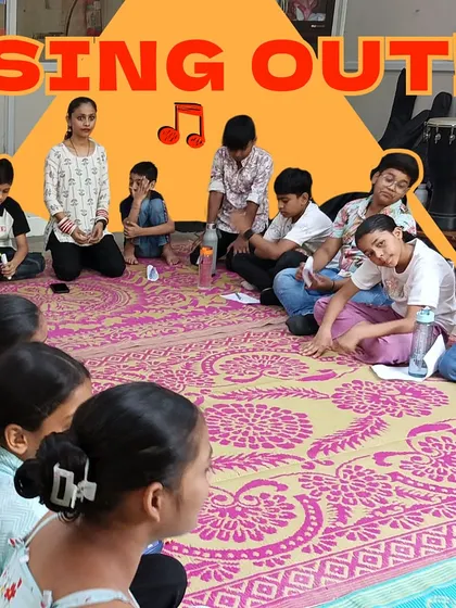 A student closes his eyes in deep concentration while singing. This powerful image shows how music can be a meditative and deeply personal experience, helping children connect with their emotions.