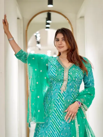 This green bandhani Anarkali is all about effortless style. The lightweight fabric and beautiful print make it a comfortable yet stunning choice.