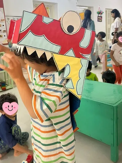 As part of our dinosaur theme, one of our Playmakers created this incredible dinosaur headgear from recycled cardboard. The children love wearing it, instantly transforming into roaring prehistoric creatures and bringing their imaginative play to life.