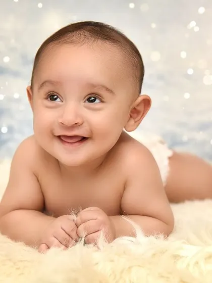 Capturing those precious early milestones is so important. This 4-month session focuses on your baby's bright eyes and happy smiles, using a simple, clean backdrop to keep your little one the star of the show.