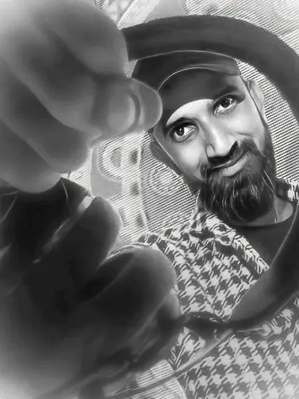 A stylized black and white photo with my headphones. Music is an emotional experience, and I aim to connect with my audience on that level.