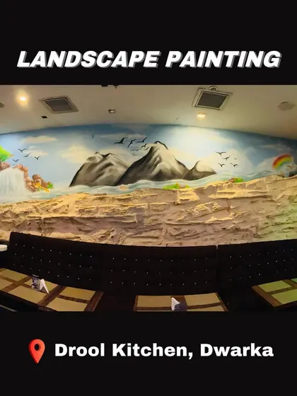 A panoramic view of the large landscape mural I painted at Drool Kitchen in Dwarka. The artwork spans the entire wall, creating an immersive dining experience with mountains and a waterfall.