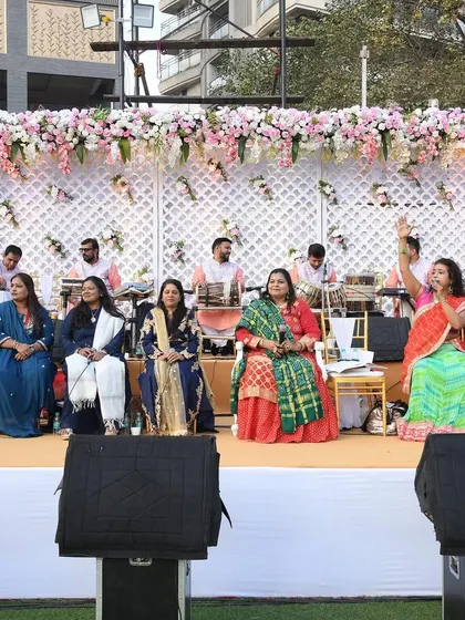 A live band performing on stage during a wedding function. I coordinate with musicians to create the perfect playlist and atmosphere for your celebration.