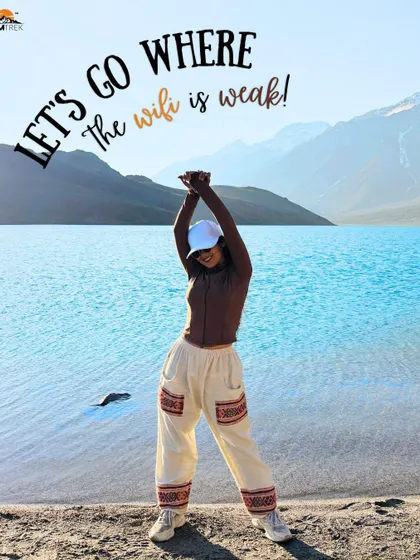 "Let's go where the wifi is weak!" A traveler celebrating the freedom and disconnect that comes with being at a place as remote and beautiful as Chandratal Lake.