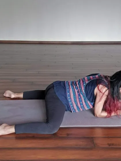 Finding grace as the body opens in this variation of Frog Pose, a deep stretch for the inner thighs and hips.