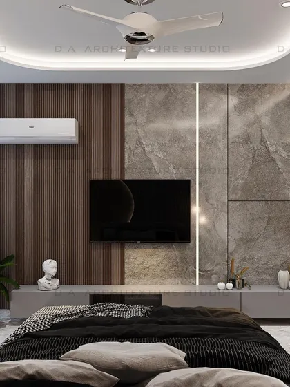 The TV wall for the beige-themed bedroom, featuring a mix of marble and wood textures that complement the serene and stylish ambiance.