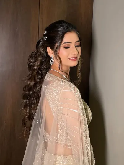 A back view of the elegant Sangeet ponytail.