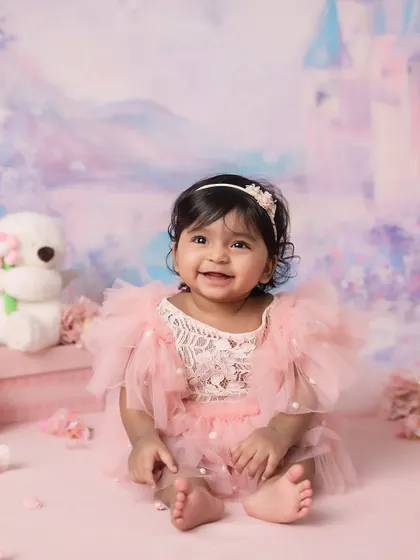 Look at that smile! The half-birthday or six-month milestone is full of such joyful energy. I love capturing their budding personalities as they learn to sit up, giggle, and explore the world.