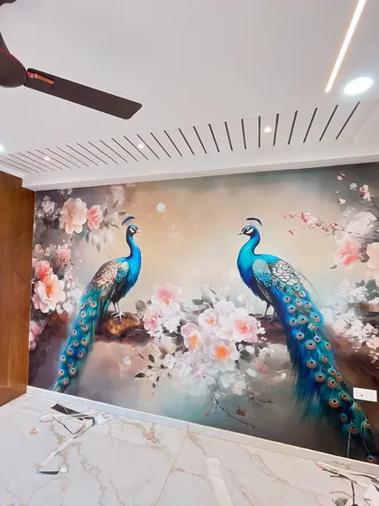 The final look of the elegant peacock mural in a client's home, perfectly complementing the marble floors and modern ceiling design.