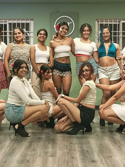 A group photo from our heels class, showcasing the confidence and community that this style inspires. It's all about empowering each other to feel our best.