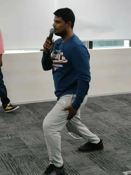 Explaining the principles of Tai Chi during a seminar. It's a practice for both body and mind.