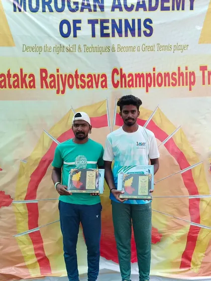 Doubles finalists Raju and Bharat at the Karnataka Rajyotsava Championship. Their performance highlights the high level of competition in our adult tournament categories.