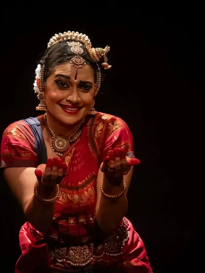 A playful and inviting gesture, captured at the Diaspora Dance Festival.
