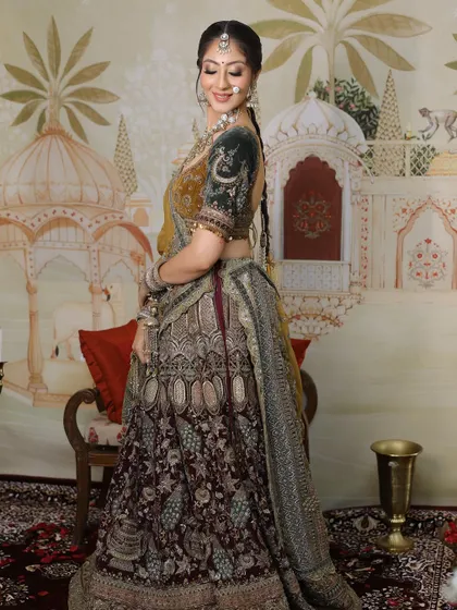 Redefining beauty, one look at a time. This bride looks stunning in her unique lehenga, with makeup that enhances her features.