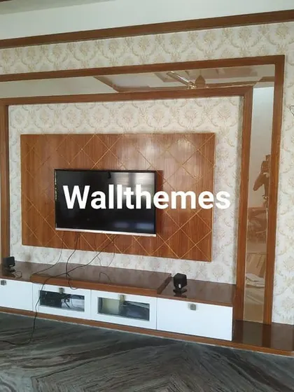 A completed installation of a damask wallpaper around a custom-built TV and entertainment unit. This shows my precision in working with existing woodwork.