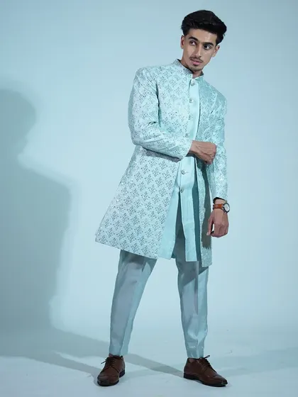 Traditional, but make it trendy. This light blue Indo-western sherwani with all-over embroidery is a fresh and modern take on classic ethnic wear.