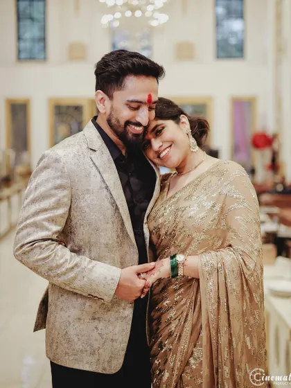 A warm, heartfelt embrace between the couple, showing their deep connection and happiness.