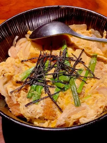 Our Oyako Don, a classic Japanese comfort food. The name literally means "parent and child," referring to the chicken and egg simmered together in a savory-sweet sauce and served over rice.