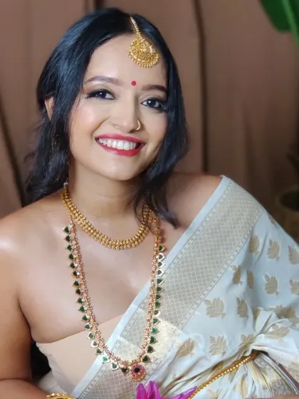 My stunning model Athira, showcasing a traditional Kerala look with captivating eyes and a radiant glow.