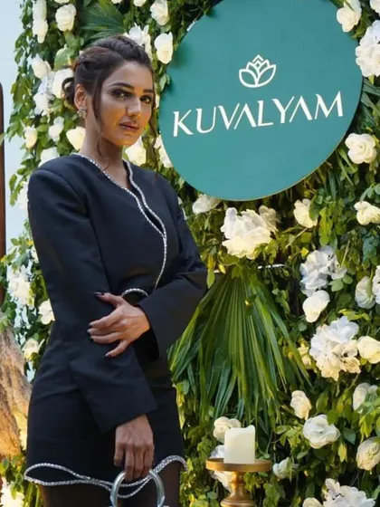 Another guest enjoying the floral photo wall. It serves as the perfect, Instagram-worthy backdrop for any event.