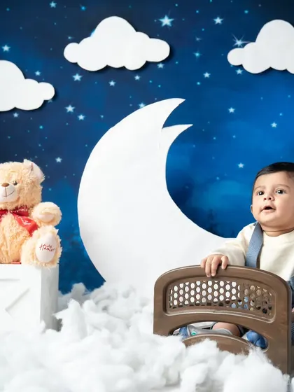 Another sweet shot from our night-sky themed sitter session. His curious look is just adorable.