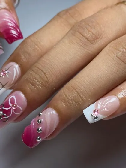 A close-up on the details of this pink ombré set, showing the delicate line art and the placement of the silver beads.