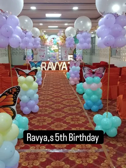 For Ravya's 5th birthday, we created a butterfly-themed walkway to welcome the guests. The balloon pillars with butterfly wings guide everyone to the main party area.