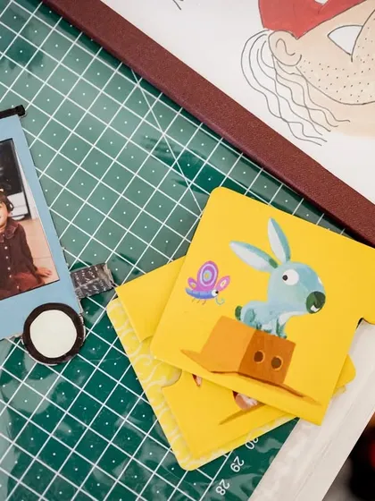A close-up of a handmade party favor, featuring a photo of the siblings. It's these small, personal details that make each event I photograph unique and special.