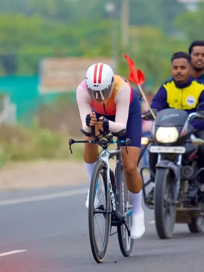 An iconic shot from the ITT at the National Championships. The local traffic adds a unique element to the race.