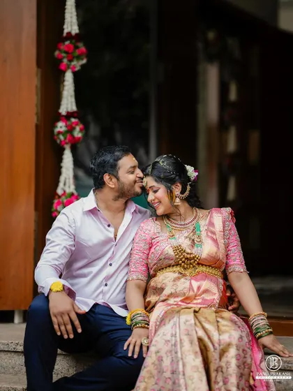 A sweet and intimate moment between the couple during their maternity shoot. The expecting mother looks absolutely radiant.