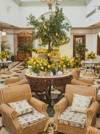 A fresh and vibrant Haldi ceremony setup, bursting with the cheerful energy of sunflowers, lemons, and wicker furniture. This shows how I infuse traditional events with a unique and modern aesthetic.