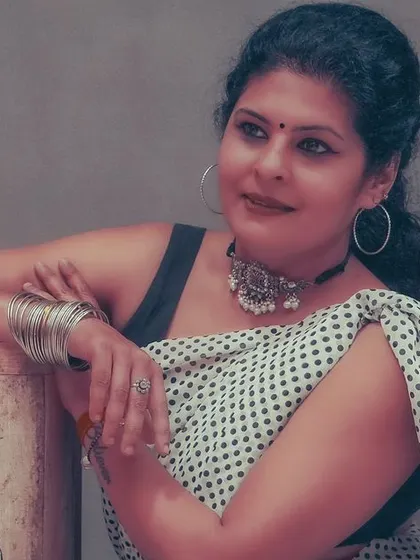 Another vintage-inspired monochrome portrait, showcasing the timeless appeal of classic Indian fashion.
