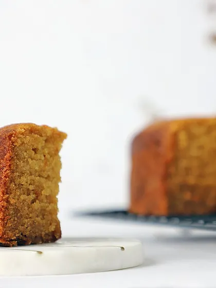 A simple slice of my vanilla cake. It’s incredibly soft and gooey, made with love and without any sugar, butter, or maida.
