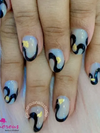 A sophisticated abstract design featuring a sheer base with bold black swirls and delicate gold foil accents.