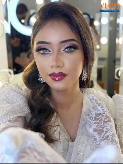 A stunning Met Gala-inspired look created by our makeup trainer. This features dramatic eyes, a bold lip, and flawless skin, teaching students the techniques for high-impact, red-carpet makeup.