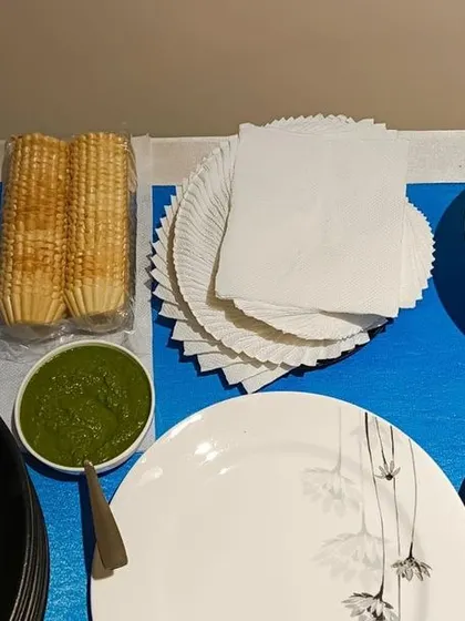 A DIY station for Mexican shells and Panzanella salad. This type of interactive counter allows guests to customize their own plates.